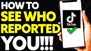 Text written "How to see who reported You" with an image of Phone with Tiktok icon